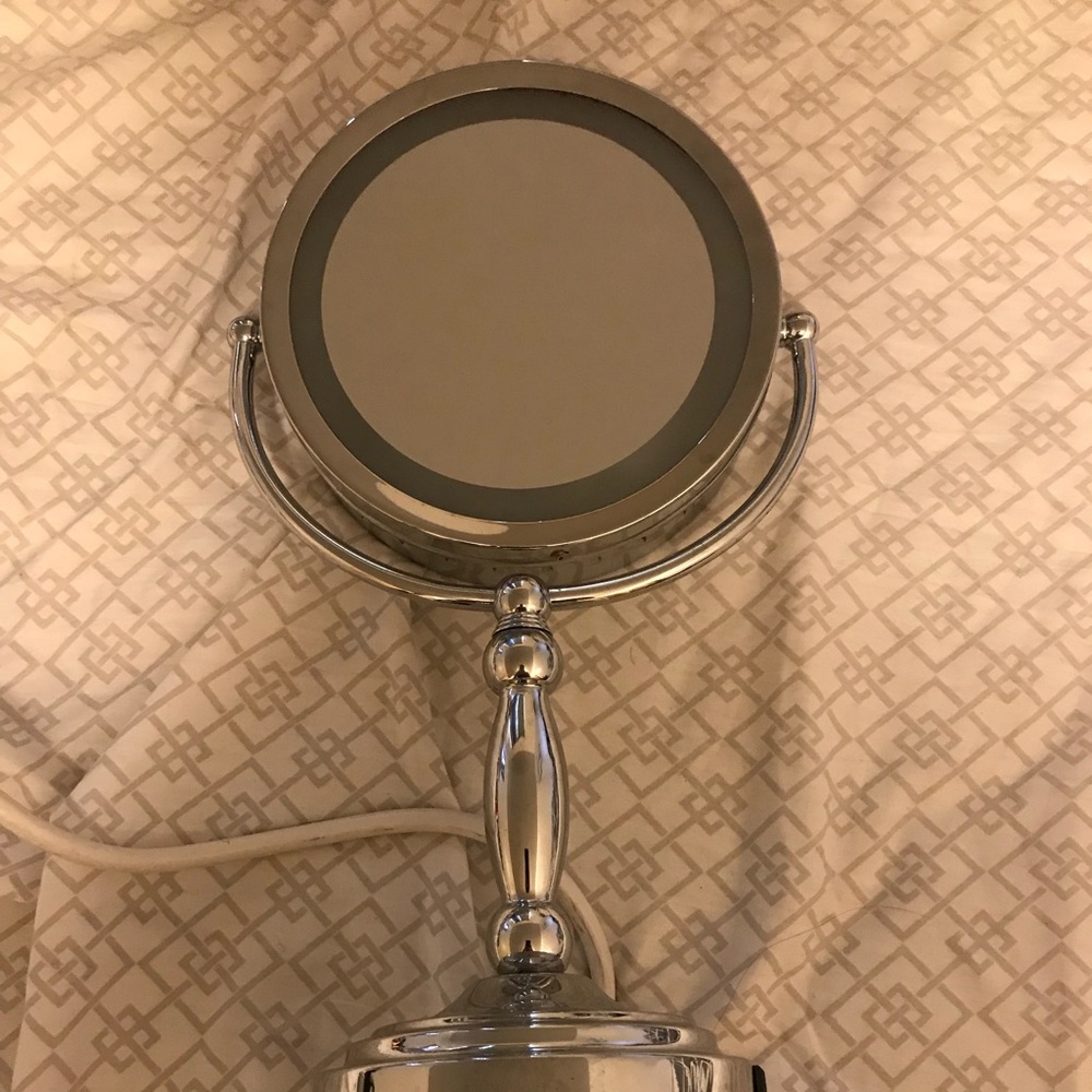 Double sided light mirror
